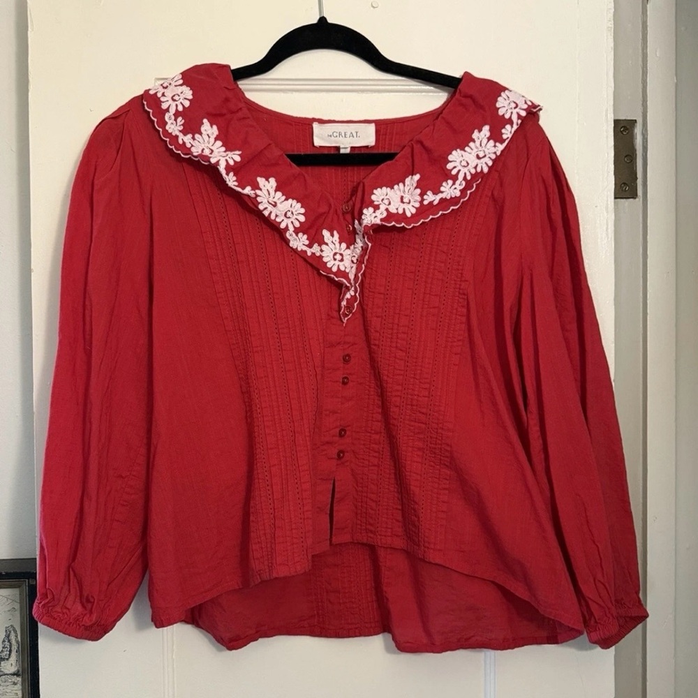 THE GREAT. Red Blouse with White Floral Trim